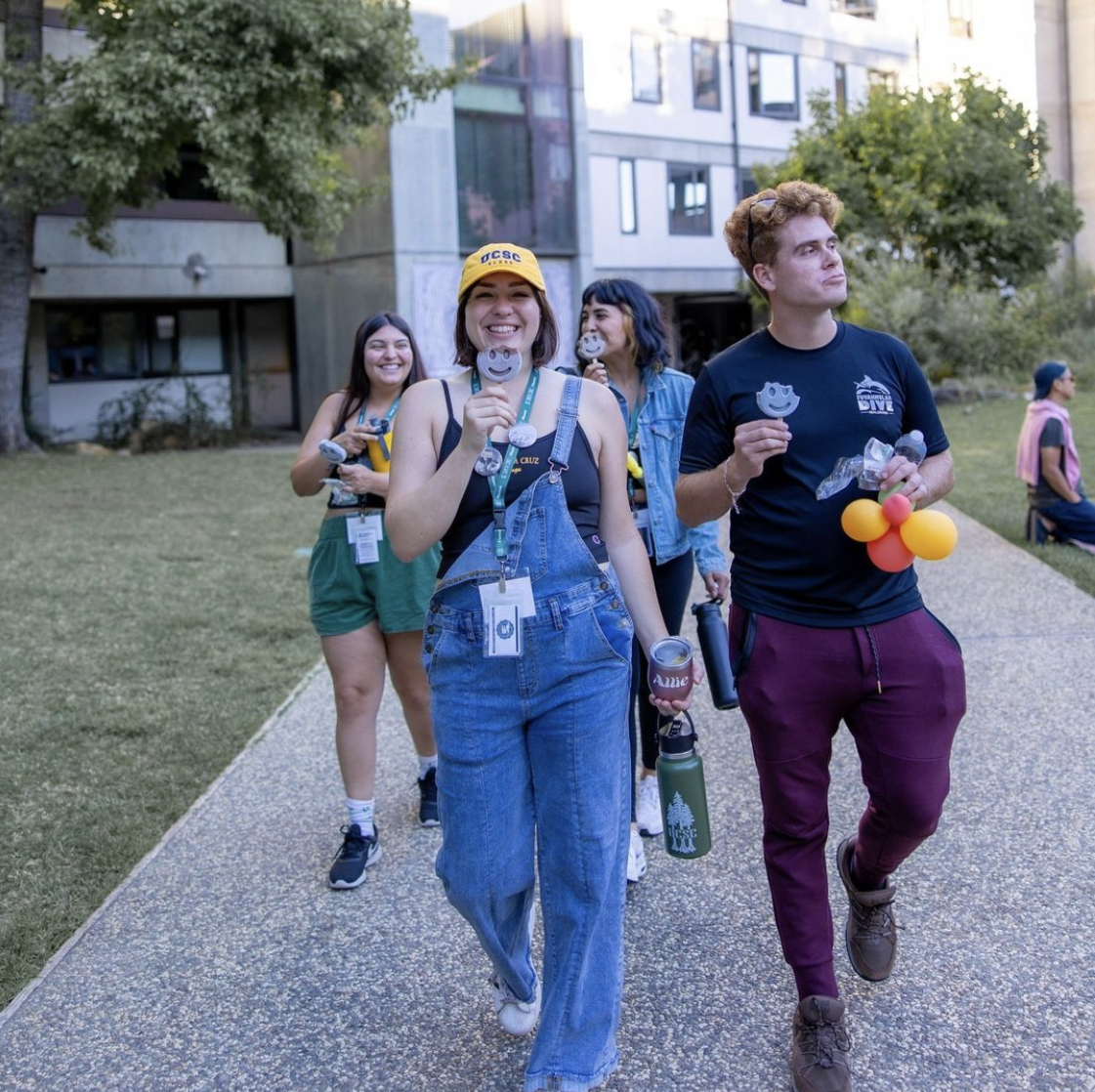 People walking together outdoors carrying frozen desserts