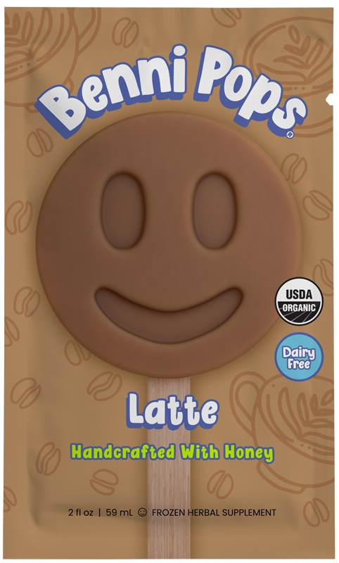 Benni Pops Latte frozen popsicle in compostable packaging, featuring a coffee-colored smiley-face pop made with organic ingredients and sweetened with honey
