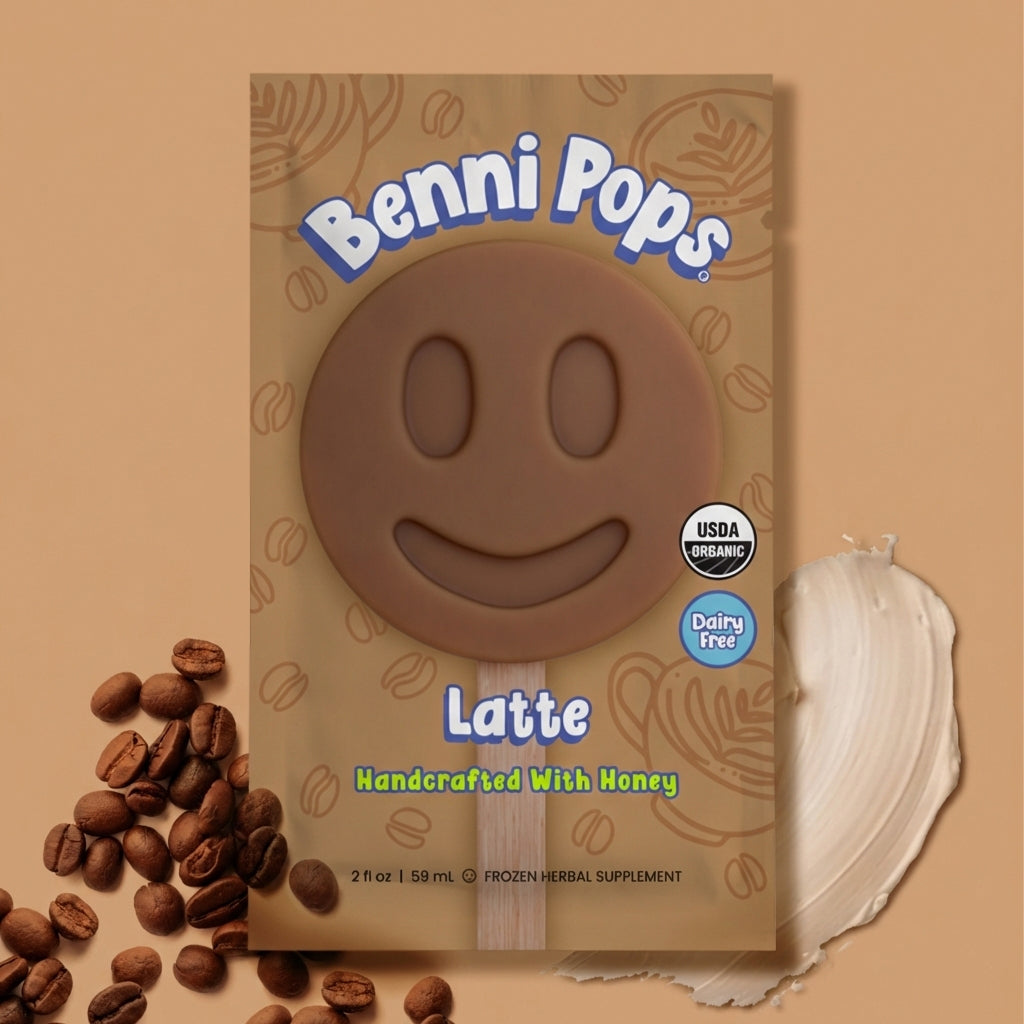 Benni Pops Latte frozen dessert in compostable packaging, featuring a coffee-colored smiley-face treat handcrafted with honey, whole coffee beans, and a creamy dairy-free base