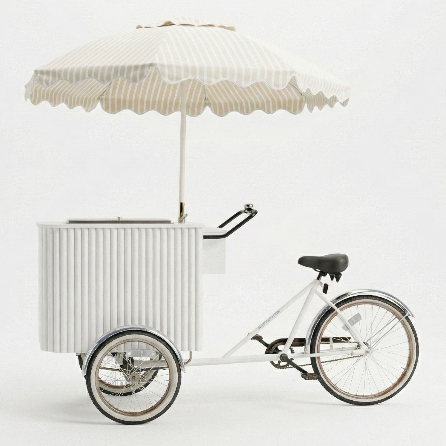 Bicycle-powered frozen dessert cart with umbrella