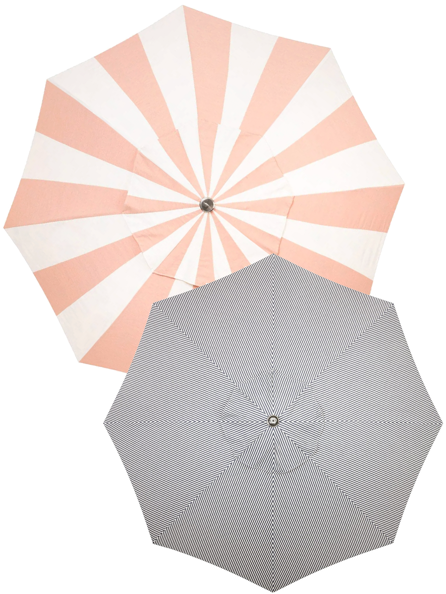 Striped umbrellas shown from above in neutral tones